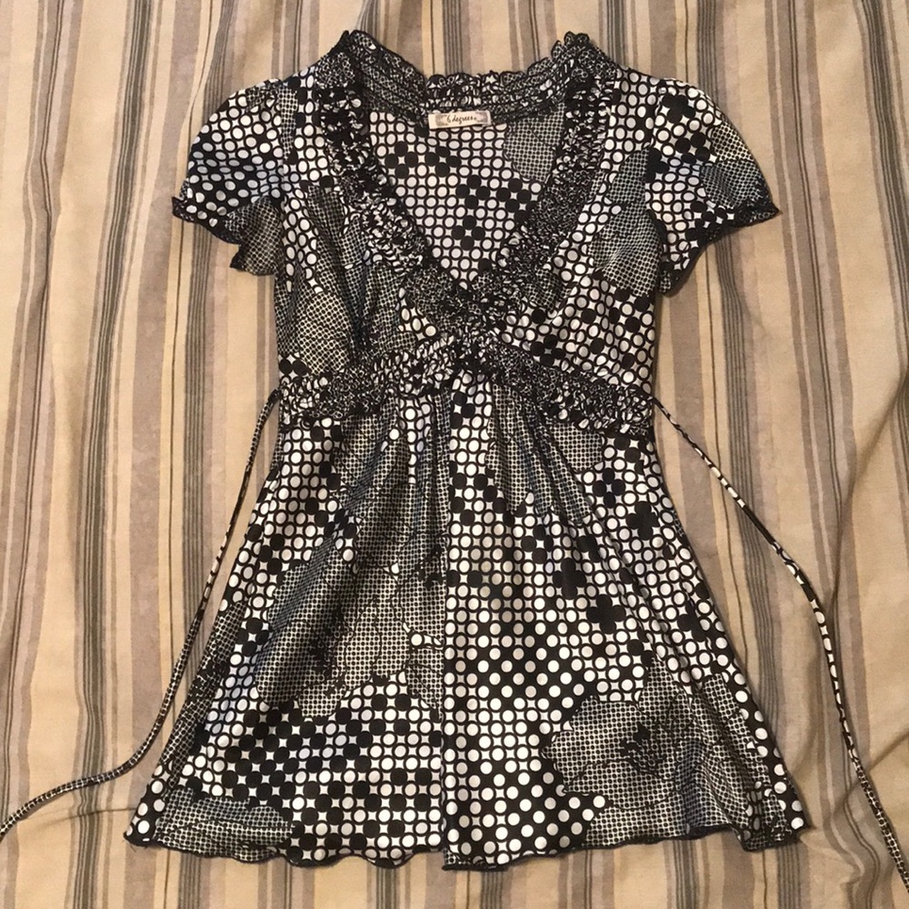 Black and white dotted silk blouse